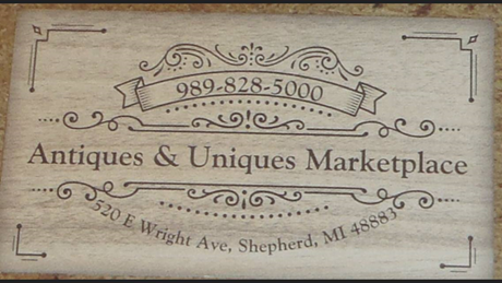 Antiques & Uniques Marketplace logo